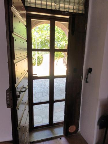 an open door with a view of a staircase at Agriturismo Le Case in Pietralunga