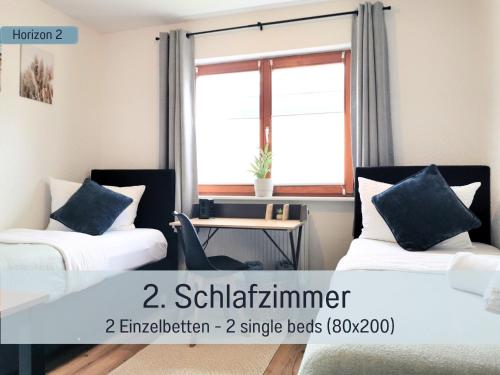 Ένα ή περισσότερα κρεβάτια σε δωμάτιο στο Newman Horizon Apartments Zirndorf - Playmobil Funpark, Nähe Messe Nürnberg und Fürth, 4 Pers, 24h Self Checkin, Waschmaschine, großer Parkplatz