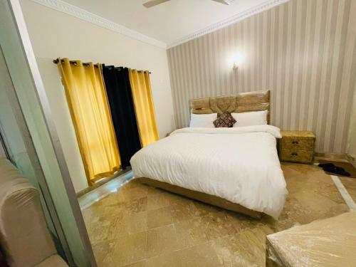 Un ou plusieurs lits dans un hébergement de l'établissement F-10 park tower