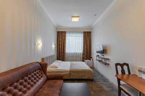 Postel nebo postele na pokoji v ubytování Persian Palace Hotel