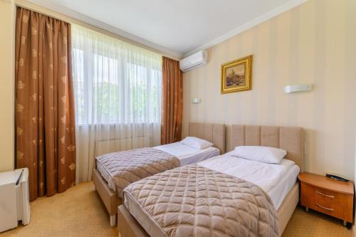 Persian Palace Hotelにあるベッド