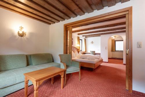 Ένα ή περισσότερα κρεβάτια σε δωμάτιο στο Heart Hotel Arlberg