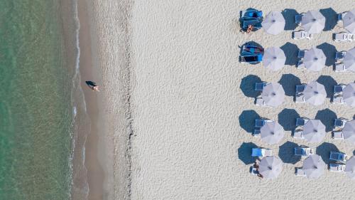 an overhead view of a group of beach huts at Aks Hotel in Durrës