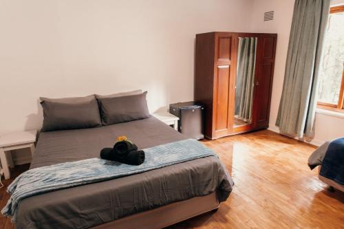 Postel nebo postele na pokoji v ubytování Wilderness Backpackers