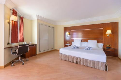 Postel nebo postele na pokoji v ubytování Hotel Moon Dreams Portomagno