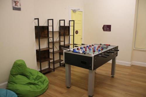 a chess board on a table in a room at Safestay Edinburgh Cowgate in Edinburgh