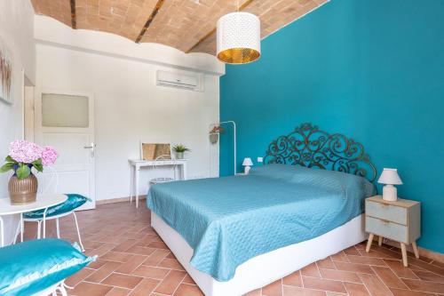 Ένα ή περισσότερα κρεβάτια σε δωμάτιο στο Aruna House - Toscana OneHH