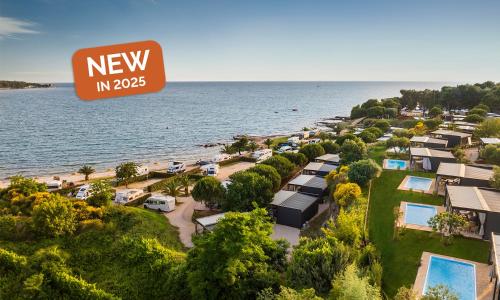 an aerial view of a resort next to the water at Aminess Planet Camping Holiday Homes Sirena in Novigrad Istria