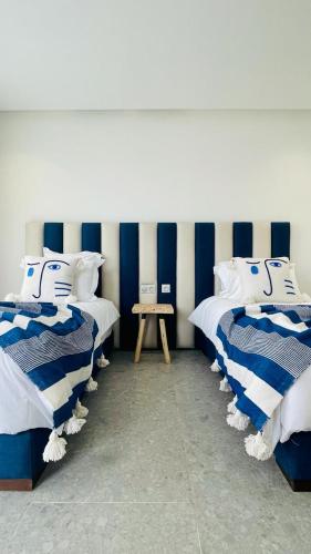 Postel nebo postele na pokoji v ubytování Imagine Villa