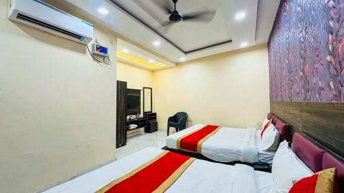 Ένα ή περισσότερα κρεβάτια σε δωμάτιο στο Hotel VK Inn