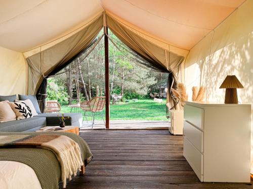 Katil atau katil-katil dalam bilik di Boho Park Glamping