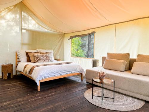 Katil atau katil-katil dalam bilik di Boho Park Glamping