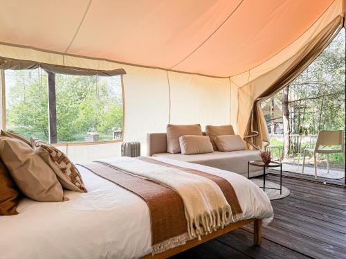 Katil atau katil-katil dalam bilik di Boho Park Glamping