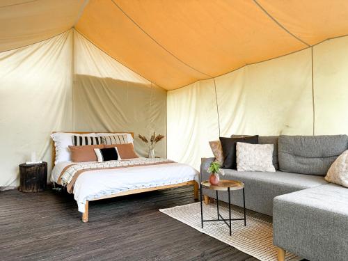 Katil atau katil-katil dalam bilik di Boho Park Glamping