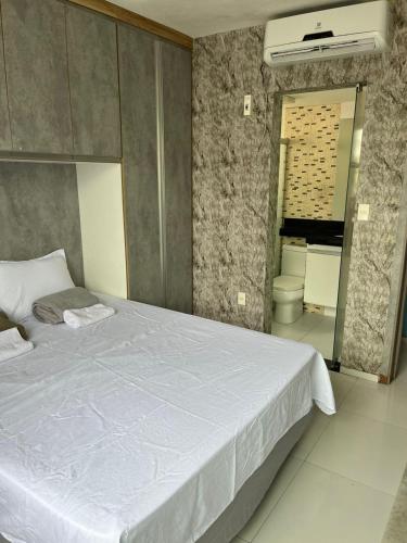 Postel nebo postele na pokoji v ubytování Apartamento moderno e bem localizado