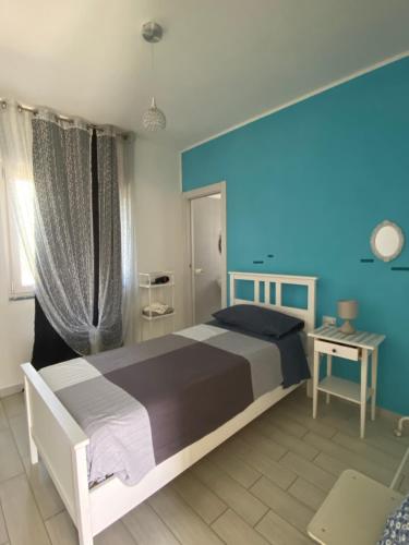 Postel nebo postele na pokoji v ubytování Brezza Del Mare