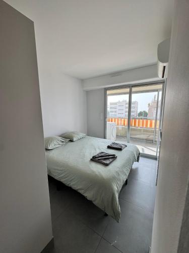Postel nebo postele na pokoji v ubytování Superbe appartement vue mer garage privatif ferme