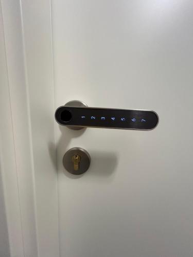 a black door handle on a white door at B&b Al Centro Nicosia in Nicosia
