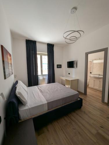 Postel nebo postele na pokoji v ubytování Maison Simone Marconi
