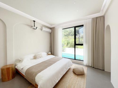 Cama o camas de una habitación en 吾桐小院
