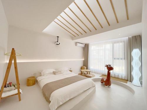 Cama o camas de una habitación en 吾桐小院