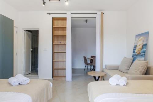 Postel nebo postele na pokoji v ubytování Apartments Donna