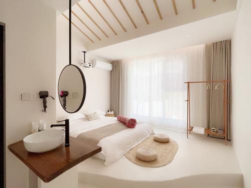 Cama o camas de una habitación en 吾桐小院