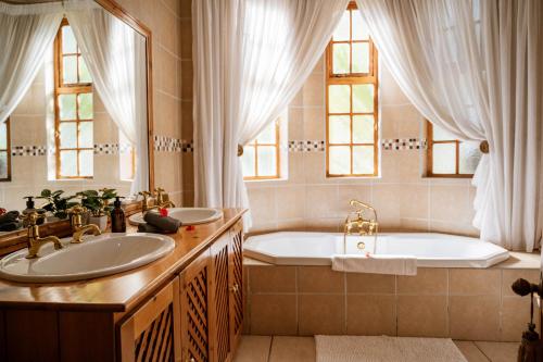 Ένα μπάνιο στο De Denne Country Guest House