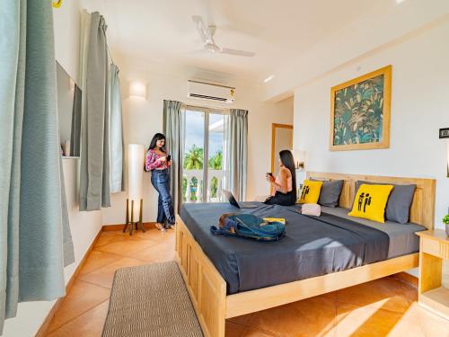 Rúm í herbergi á The Hosteller Goa, Old Goa