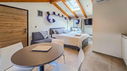 Postel nebo postele na pokoji v ubytování Apartman Palazzo San Zuian