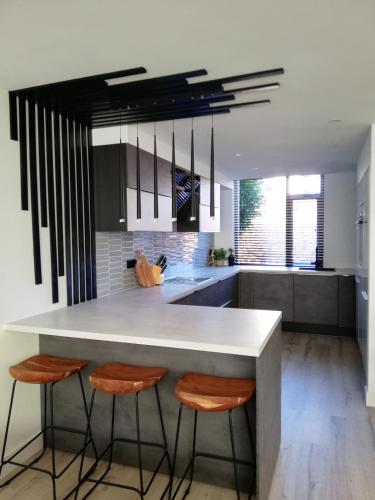 Una cocina o cocineta en Cozy Nest