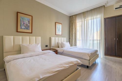 Кровать или кровати в номере Lahoya Homes