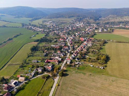 an aerial view of a village with houses and fields at Apartmán Zara in Dobrá Voda
