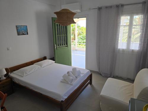 Postel nebo postele na pokoji v ubytování Oasis