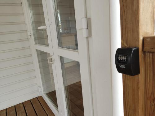 a door with a glass window on a porch at Smart Home Venezia mit Terrasse, Europapark, Rulantica in Boofzheim