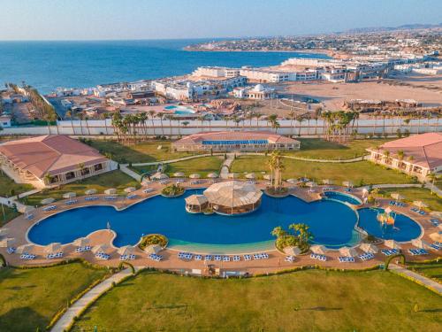 an aerial view of the resort and the ocean at Pickalbatros Golf Luxury Suites - All Inclusive in Sharm El Sheikh
