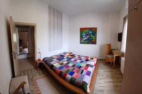 Ένα ή περισσότερα κρεβάτια σε δωμάτιο στο Diavaide Apartment