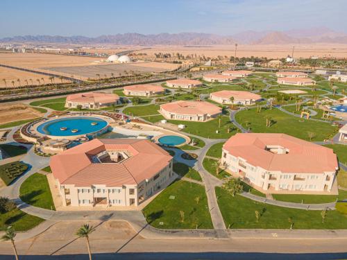an aerial view of a resort with a pool at Pickalbatros Golf Luxury Suites - All Inclusive in Sharm El Sheikh