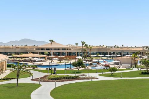a view of the pool at a resort at Pickalbatros Golf Luxury Suites - All Inclusive in Sharm El Sheikh