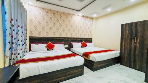 Ένα ή περισσότερα κρεβάτια σε δωμάτιο στο Hotel VK Inn