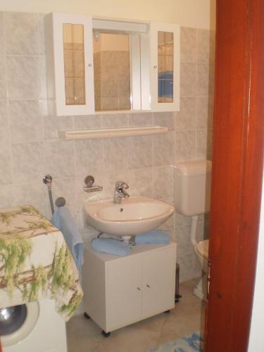 Kúpeľňa v ubytovaní Apartments Kuzman