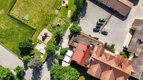 an overhead view of a house with a yard at Hotel Gasthof Süßer Grund in Albstadt