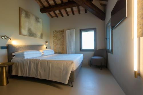 Ένα ή περισσότερα κρεβάτια σε δωμάτιο στο Villa Maracci