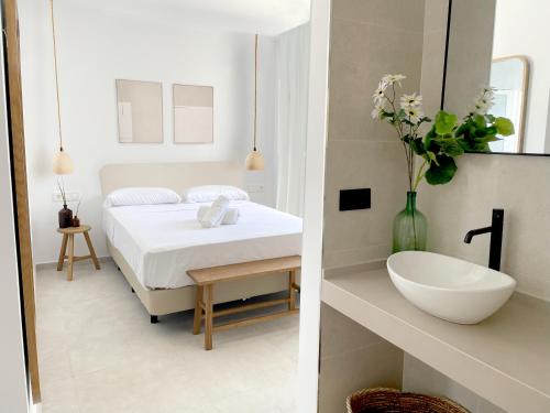 Postel nebo postele na pokoji v ubytování Hotel Maram