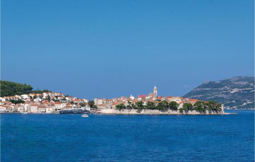 a small island in the middle of a body of water at Lovely Apartment In Korcula With Sauna in Korčula