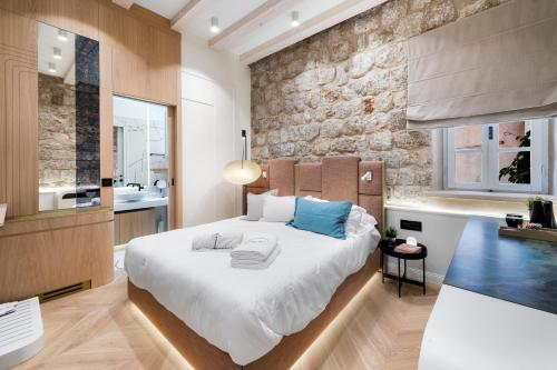 Ένα ή περισσότερα κρεβάτια σε δωμάτιο στο Casa Rosa