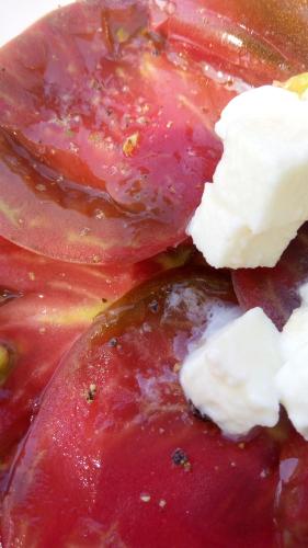 a plate of food with meat and cheese on it at Villa Marie in Courçon