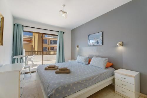 Katil atau katil-katil dalam bilik di 3 bedrooms with views