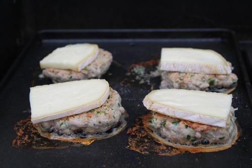 four sandwiches with cheese on top in an oven at Villa Marie in Courçon