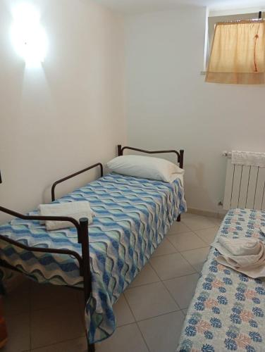 Postel nebo postele na pokoji v ubytování Nadir